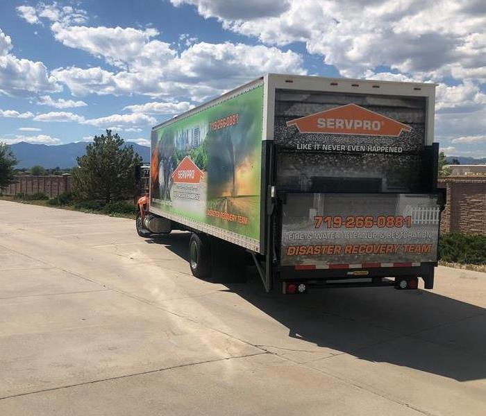 The back end of a semi branded with SERVPRO logo for the disaster recovery team