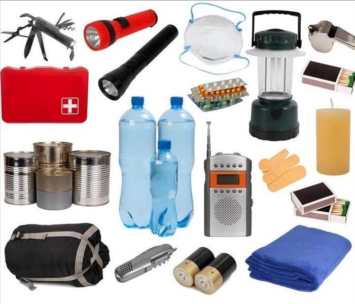 Emergency kit supplies: water bottle, matches, rope, flashlight, kit bag, 